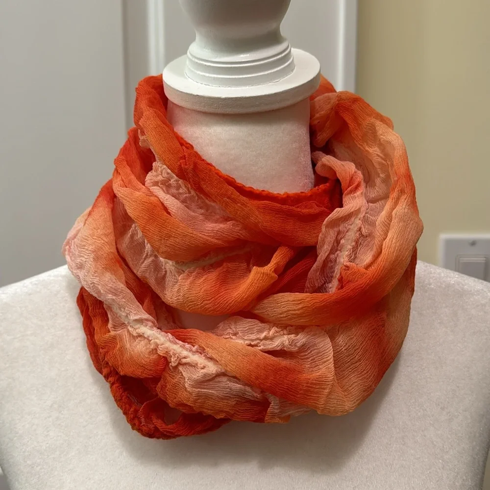 Vintage Masino Silk and Wool Crinkle Scarf in vibrant orange hues.